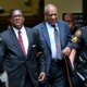 Bill Cosby (second from right) leaves with his publicist Andrew Wyatt at the Allegheny County Courthouse in Pittsburgh on May 24, 2017, after the third day of jury selection in his sexual assault case. The case is set for trial June 5. (Keith Srakocic/AP Images)